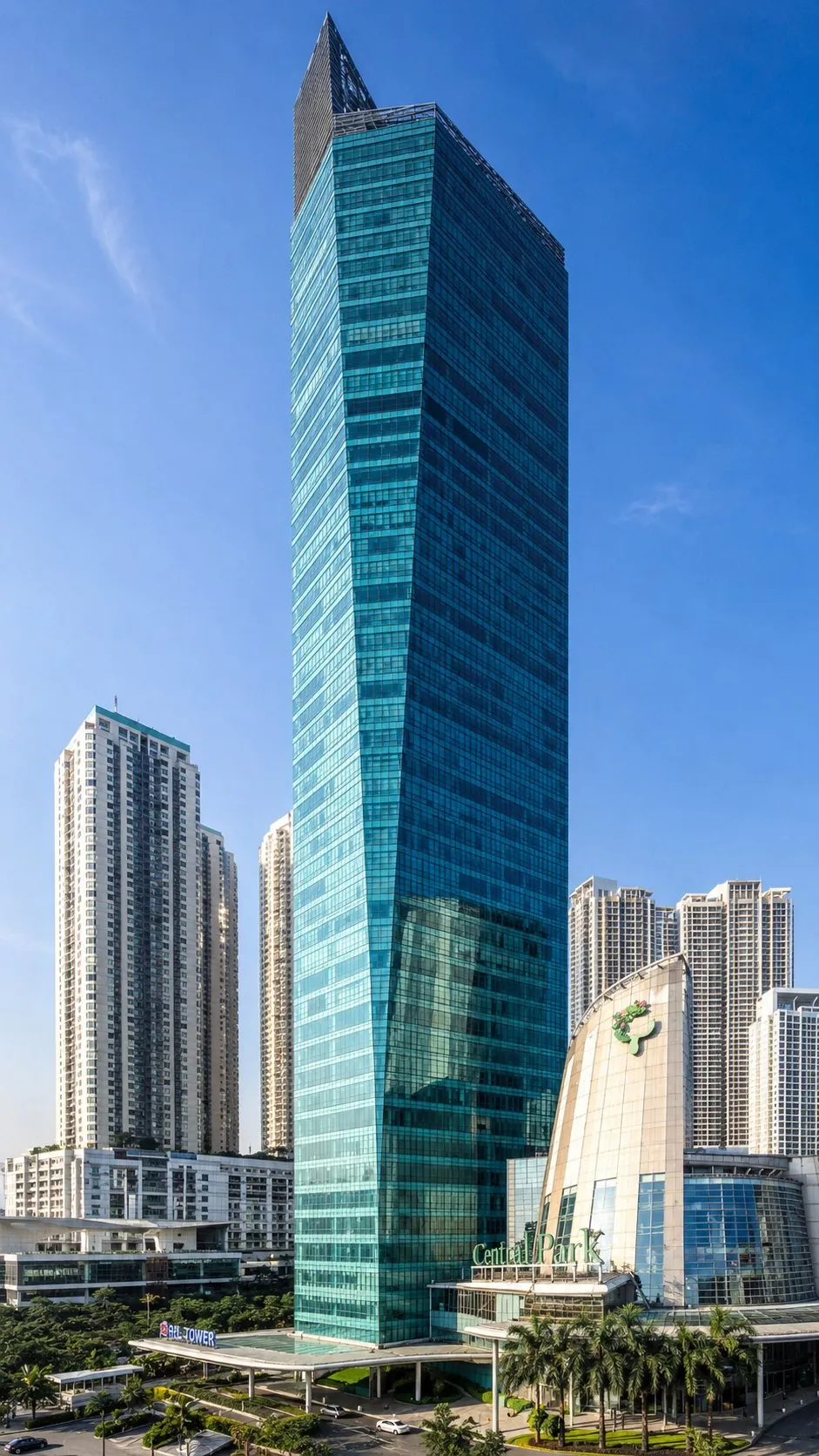 APL Tower in West Jakarta under a clear blue sky